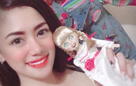 Barbie Takei with Annabelle doll